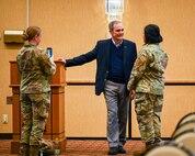 U.S. Air Force retired Col. Lee Ellis, former Vietnam War pilot and prisoner of war (POW), shares his experiences and insights with Airmen during a presentation at Misawa Air Base, Japan, Nov. 15, 2024.
