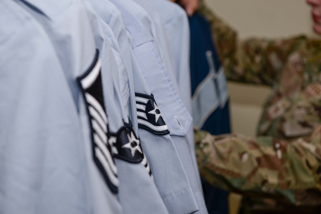 U.S. Air Force Master Sgt. Emily Dejesus, 51st Civil Engineer Squadron first sergeant, organizes clothing at the Airman’s Attic at Osan Air Base, Republic of Korea, Oct. 18, 2024. The Osan Airman’s Attic reopened in the dayrooms on the top floor of building 386. Since the space is temporary until a bigger space comes available, enlisted and officers seeking free uniform pieces and accessories can gain access through their first sergeant. (U.S. Air Force photo by Staff Sgt. Kahdija Slaughter)