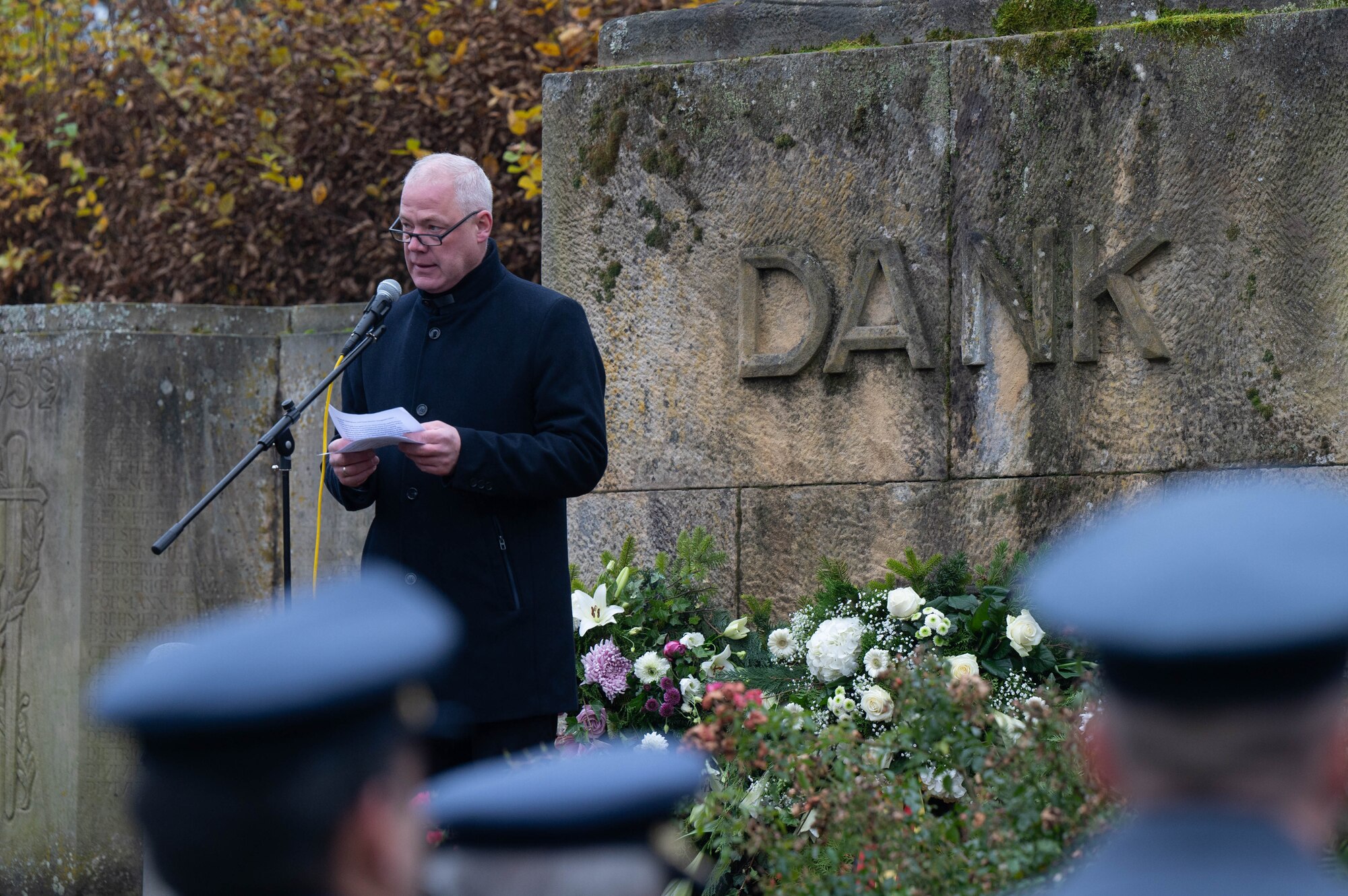 The mayor of Ramstein-Miesenbach speaks at a ceremony.