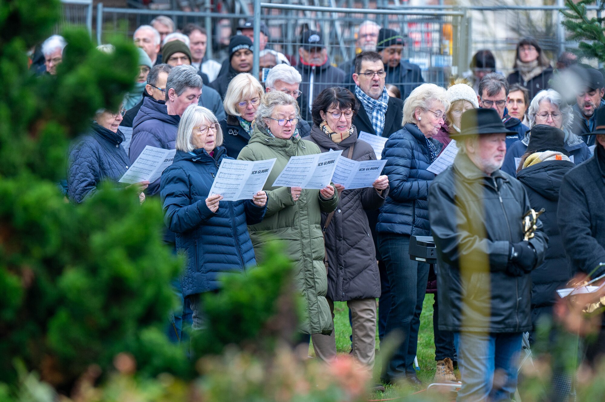 A choir sings at a ceremony.