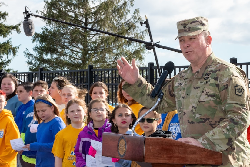 U.S. Army Brig. Gen. John Pippy, Pennsylvania’s acting adjutant general, delivers opening remarks during an open house at Fort Indiantown Gap, Pennsylvania, Nov. 16, 2024. This free event featured Miss Pennsylvania, live tactical demonstrations, flyovers, displays of military equipment and vehicles, food trucks, live music and a performance by the Pennsylvania National Guard’s Ambassador Demonstration Team. (U.S. Army National Guard photo by Wayne V. Hall)