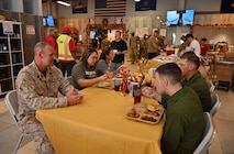 U.S. Marine Corps Sgt. Maj. Michael Woods, command senior enlisted leader, U.S. Africa Command, speaks to deployed service members on Thanksgiving at Camp Lemonnier, Djibouti, Nov. 23. 2023.