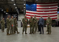 U.S. Air Force Brig. Gen. Patrick Miller, Air Force Civil Engineer Center commander, Joint Base San Antonio-Lackland, Texas, talks with service members at Royal Air Force Mildenhall, England, Nov. 14, 2024. Miller attended meetings about RAF Mildenhall’s current infrastructure needs and requirements. (U.S. Air Force photo by Senior Airman Nash Truitt)