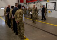U.S. Air Force Brig. Gen. Patrick Miller, Air Force Civil Engineer Center commander, Joint Base San Antonio-Lackland, Texas, talks with service members at Royal Air Force Mildenhall, England, Nov. 14, 2024. Miller attended meetings about RAF Mildenhall’s current infrastructure needs and requirements. (U.S. Air Force photo by Senior Airman Nash Truitt)