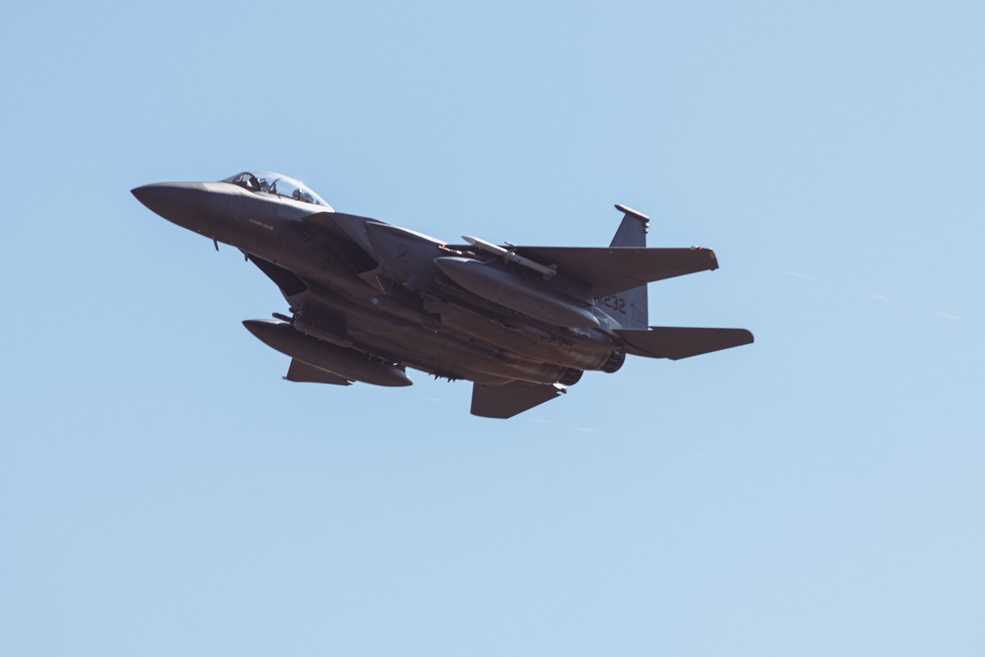 Jet takes off from a runway.
