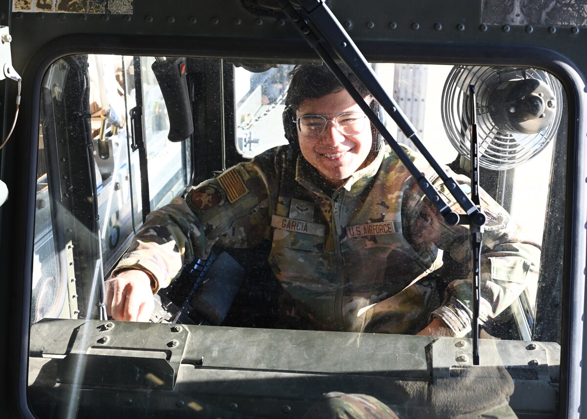 U.S. Air Force Airman 1st Class Emanuel Garcia, 355th Logistics Readiness Squadron air terminal function representative, drives an aircraft loader at Davis-Monthan Air Force Base, Arizona, Nov. 6, 2024. Garcia assisted US Army Combat Capabilities Development Command Soldier Center and U.S. Army Yuma Proving Ground with concept testing an airdrop by simulating an airdrop of over 37,000 pounds of aircraft fuel in an austere environment in support of a US Transportation Command funded project. (U.S. Air Force photo by Staff Sgt. Abbey Rieves)