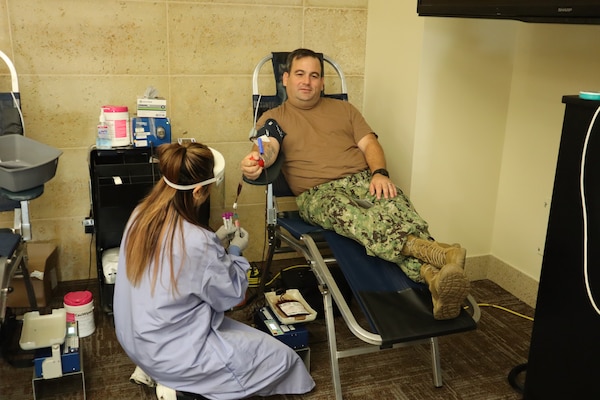 Chief Petty Officer Richard Anderson, Expeditionary Medical Facility 150 Alpha’s operations chief, donates blood during an Armed Services Blood Program – Camp Pendleton blood drive coordinated by the Navy Medicine Readiness and Training Command Camp Pendleton Junior Enlisted Association on Nov. 18, 2024, in the Naval Hospital Camp Pendleton Galley Meeting Room.