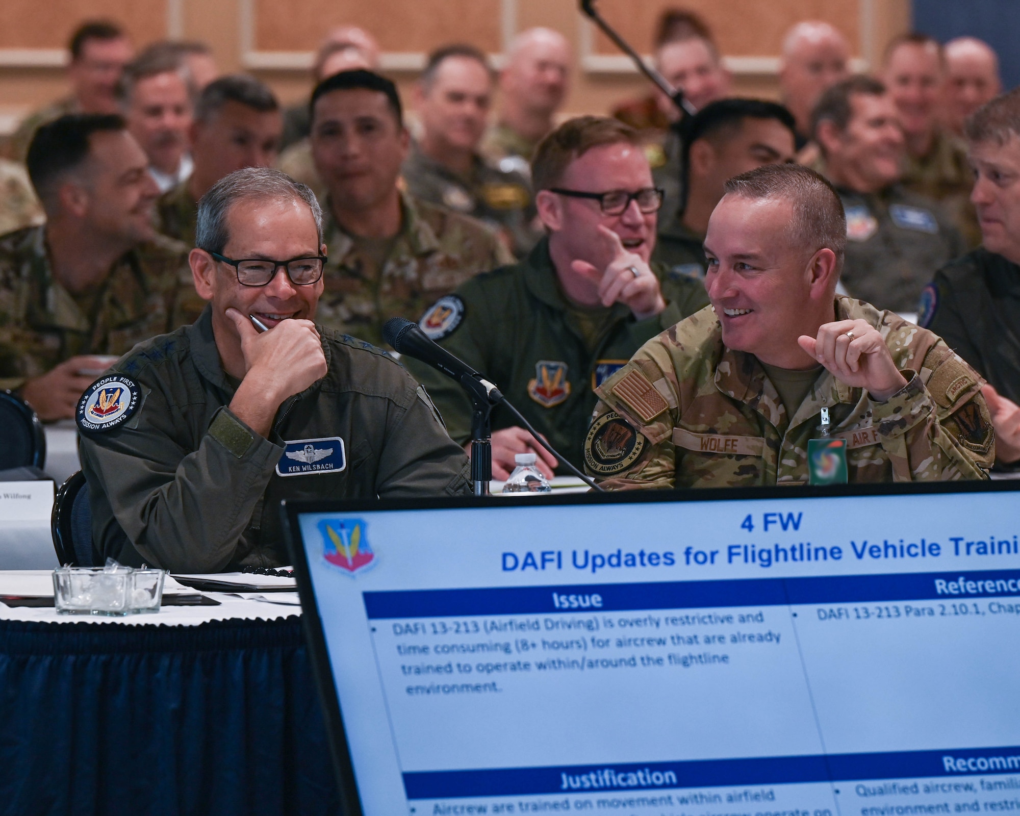 U.S. Air Force Gen. Ken Wilsbach, commander of Air Combat Command, and Chief Master Sgt. Dave Wolfe, ACC command chief, chair the "Cutting the Red Tape Forum" during the ACC Fall Conference at Joint Base Langley-Eustis, Virginia, recently. During this conference, Wilsbach, Wolfe, and ACC senior leaders considered innovative solutions proposed by units, to help improve processes across the command. (U.S. Air Force photo by Marcus Bullock)