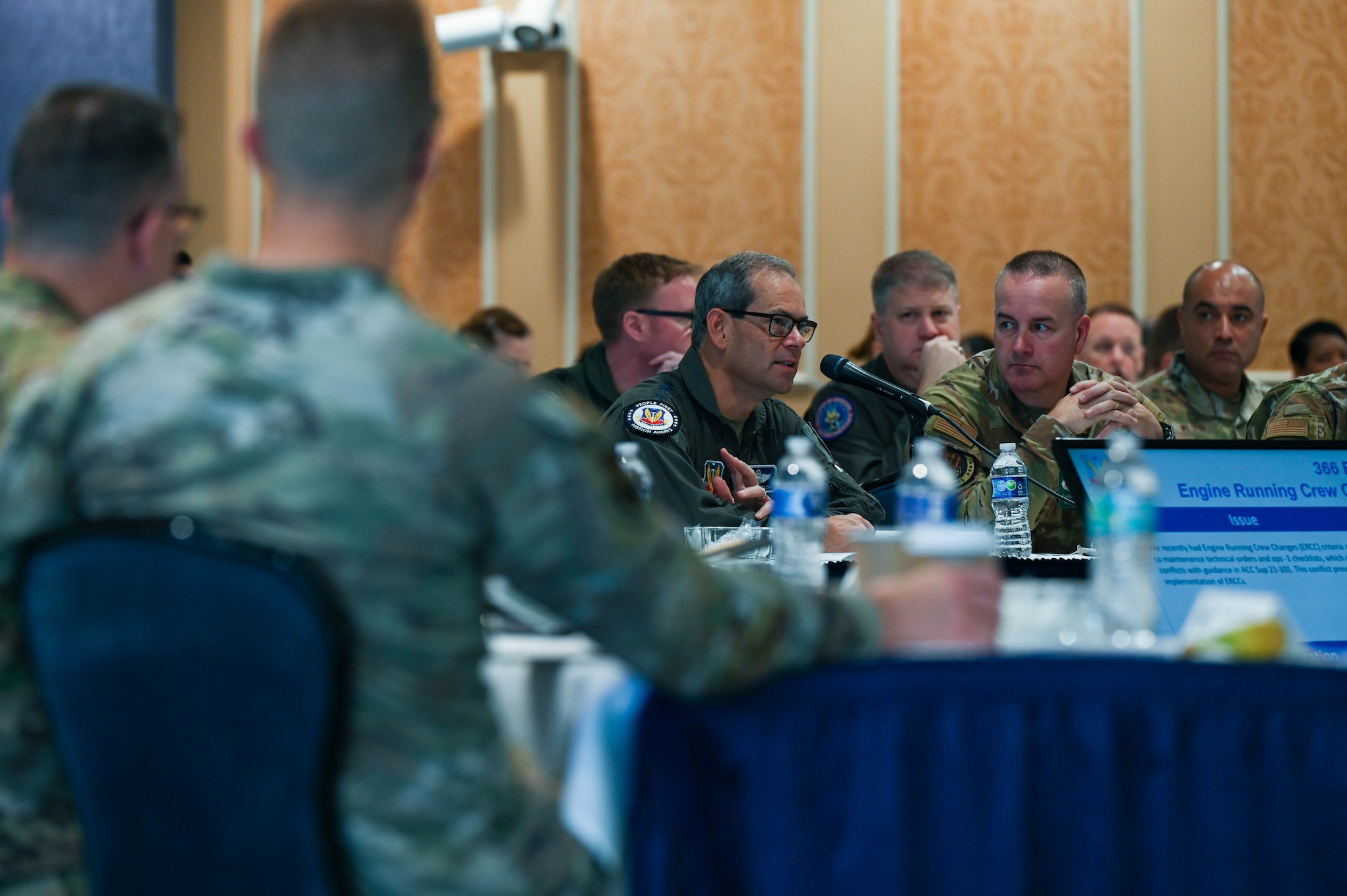 U.S. Air Force Gen. Ken Wilsbach, commander of Air Combat Command, speaks to a wing representative at the "Cutting the Red Tape Forum" during the ACC Fall Conference at Joint Base Langley-Eustis, Virginia, recently. The purpose of this panel was to streamline processes for ACC units by bringing modern solutions to problems they encounter during day-to-day operations. (U.S. Air Force photo by Marcus Bullock)