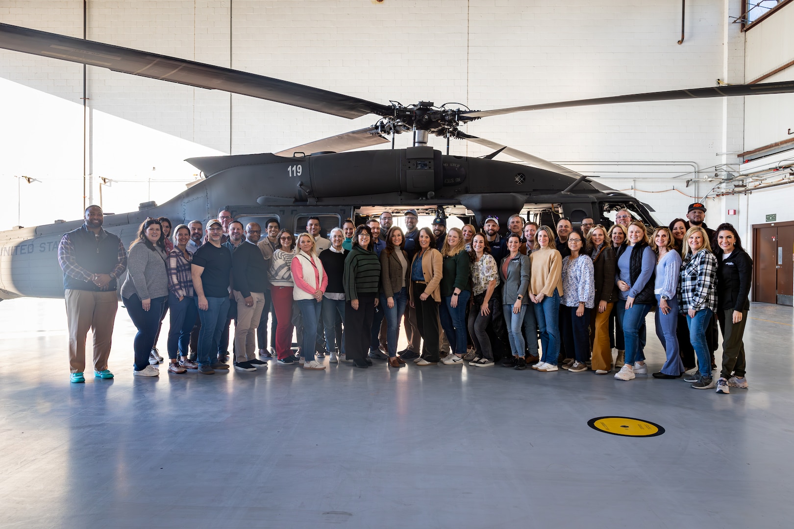 Members of Leadership Oklahoma gathered to learn about the Oklahoma National Guard and its role in local and national affairs at the Army Aviation Support Facility #2 in Tulsa, Nov. 14, 2024. The visit included briefs from both Air and Army National Guard representatives on the reach and readiness of the Oklahoma National Guard, and culminated in a ride on a UH-60 Black Hawk. (Oklahoma National Guard photo by Cpl. Danielle Rayon)