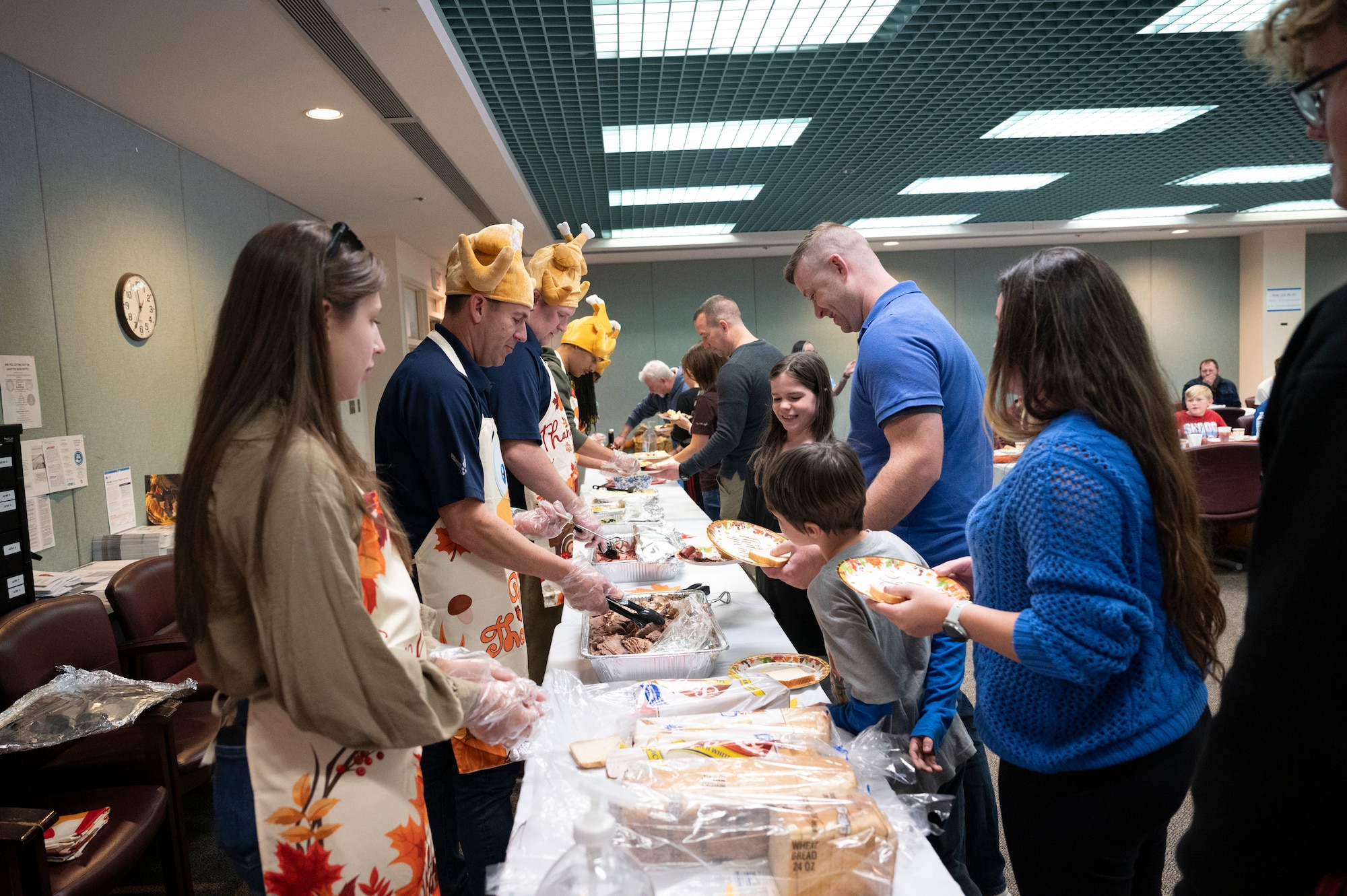 A group serves a meal.