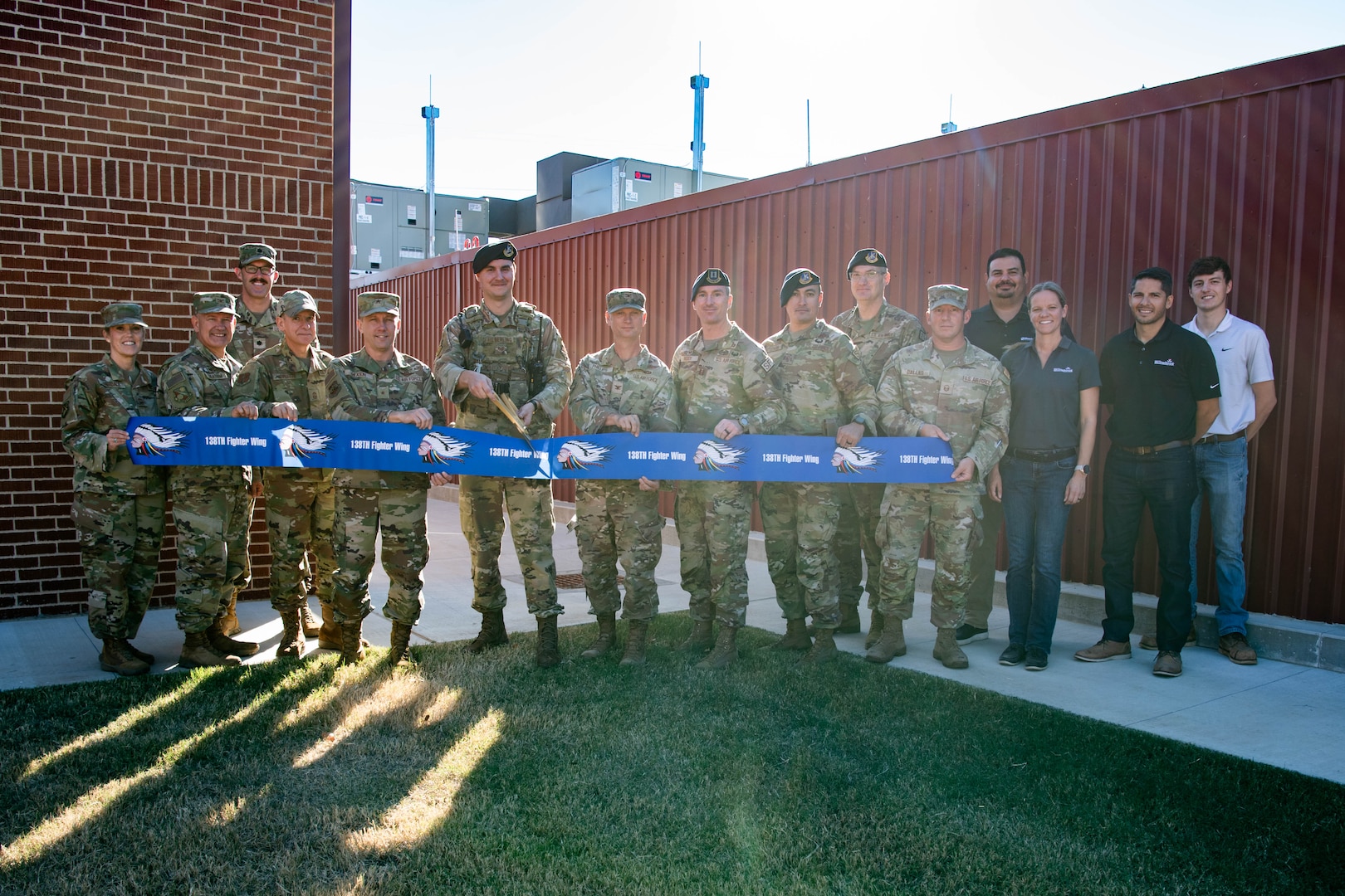 Members of the Oklahoma Air National Guard and Willowbrook Construction Incorporated take part in a ribbon cutting for the new small arms range complex at the Tulsa Air National Guard Base, Okla., Oct. 22, 2024. The complex provides an small arms range capable of training and certifying security forces, 138th Fighter Wing Airmen, and other local partners. (Air National Guard photo by Master Sgt. Rebecca Imwalle)