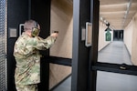 Brig. Gen. Michael Meason, Oklahoma National Guard assistant adjutant general, fires the first shot in the new small arms range complex at the Tulsa Air National Guard Base, Okla., Oct. 22, 2024. The new complex was a multi-million construction project that spanned over a one year and seven month time period. (Air National Guard photo by Master Sgt. Rebecca Imwalle)