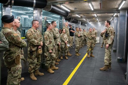 Tech. Sgt. Zachariah Hilberling, 138th Security Forces Squadron Combat Arms Training and Maintenance section chief, speaks about the capabilities of the new small arms range complex at the Tulsa Air National Guard Base, Okla., Oct. 22, 2024. The new complex includes a range with 14 lanes, a classroom for training, a weapons cleaning and maintenance room, and office space. (Air National Guard photo by Master Sgt. Rebecca Imwalle)