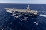 The world's largest aircraft carrier, USS Gerald R. Ford steams in the Atlantic Ocean, Nov. 12, 2024. The Gerald R. Ford Carrier Strike Group is underway in the Atlantic Ocean completing Group Sail. Group Sail is the first at-sea integrated phase training event during a routine deployment training cycle. It is designed to challenge the Gerald R. Ford CSG’s ability to use the capabilities of the USS Gerald R. Ford (CVN 78), USS Winston S. Churchill (DDG 81), Carrier Air Wing (CVW) 8, Destroyer Squadron (DESRON) 2, and embarked Information Warfare team as a cohesive Strike Group to meet Navy and Joint Warfighting requirements that increases warfighting capability and tactical proficiency across all domains. (U.S. Navy photo by Mass Communication Specialist 2nd Class Jacob Mattingly)