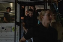 New U.S. Marine Corps recruits with Echo Company, 2nd Recruit Training Battalion, rush off a bus as part of a receiving event at Marine Corps Recruit Depot San Diego, California, Nov. 4, 2024. During the receiving process, recruits are checked for contraband, , make scripted phone calls home, and are issued their gear required for training. (U.S. Marine Corps photo by Lance Cpl. Jacob B. Hutchinson)