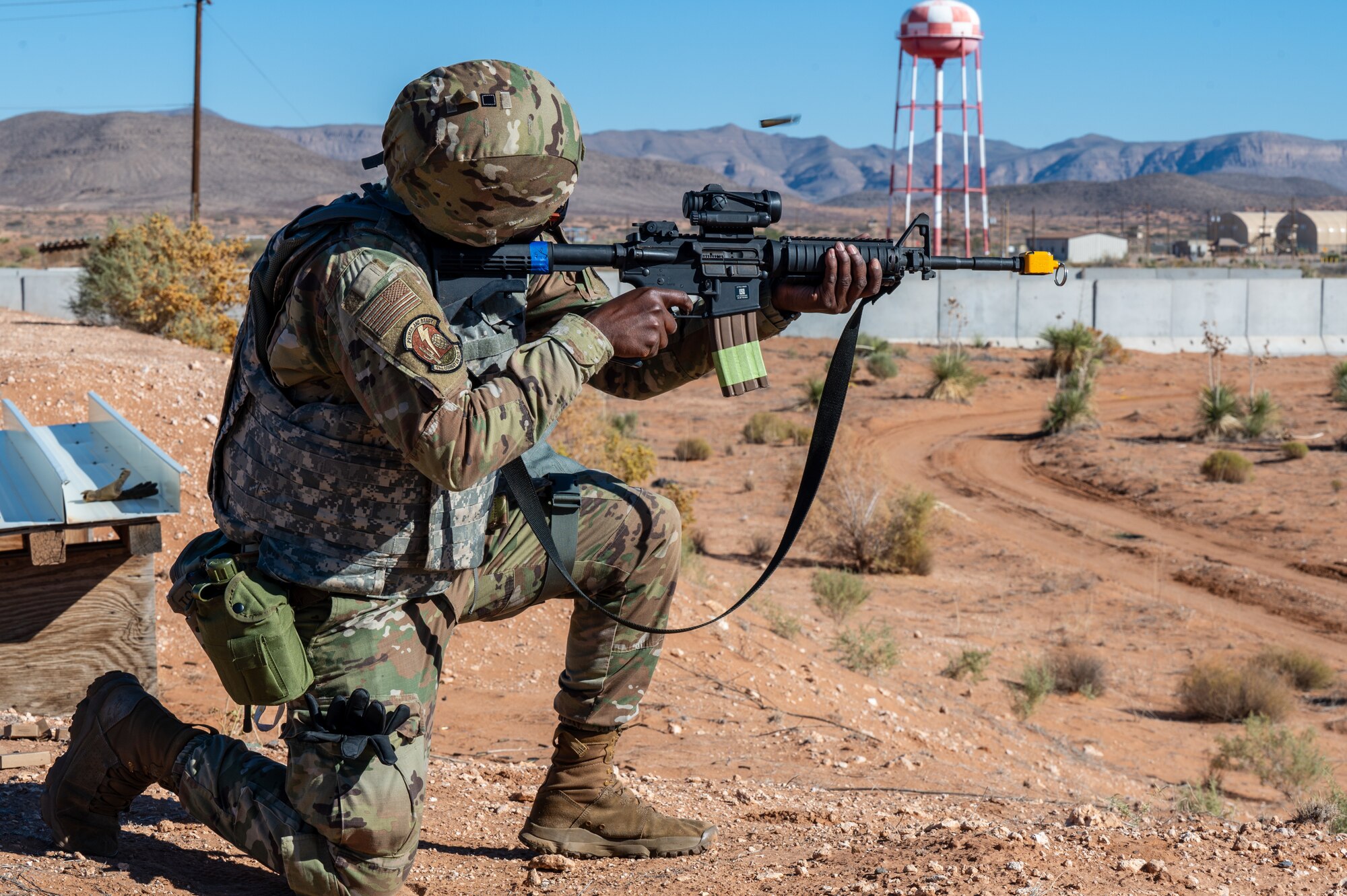 U.S. Air Force Airman 1st Class Shandy Phillips, 355th Communications Squadron vulnerability management technician, engages with simulated opposing forces at McGregor Range, New Mexico, Nov. 9, 2024. During the 11th Air Task Force’s first field exercise Airmen appropriately responded to threats and defended their base. (U.S. Air Force photo by Airman 1st Class Jasmyne Bridgers-Matos)