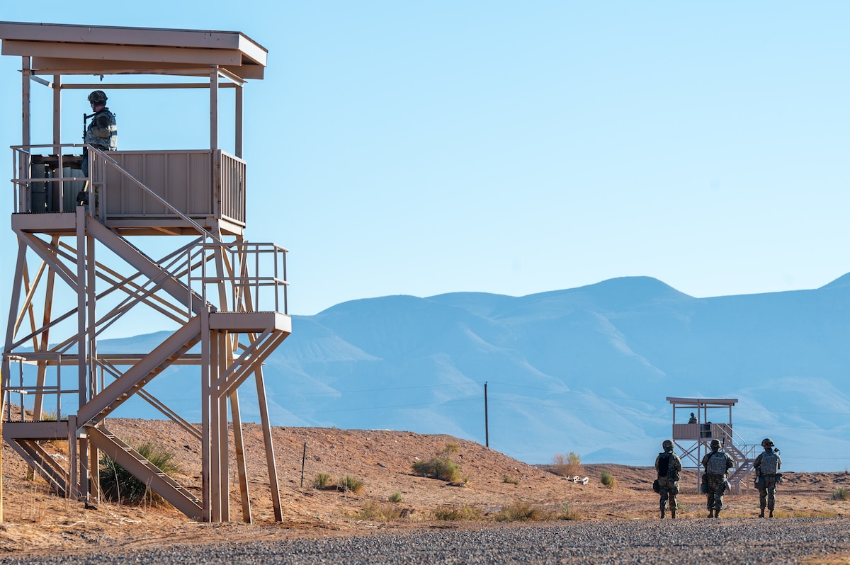 U.S. Airmen assigned to the 11th Air Task Force patrol their base’s perimeter at McGregor Range, New Mexico, Nov. 9, 2024. The 11th ATF’s first field exercise involved a base defense culminating training event. (U.S. Air Force photo by Airman 1st Class Jasmyne Bridgers-Matos)