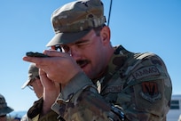 U.S. Air Force Staff Sgt. Justin Stoeckle, 355th Munitions Squadron conventional support super, uses a compass to find the location of the next landmark during the land navigation portion of the 11th Air Task Force’s first field exercise at McGregor Range, New Mexico, Nov. 8, 2024. Land navigation is a skill set that enables Airmen to survive and complete the mission under any circumstances. (U.S. Air Force photo by Airman 1st Class Jasmyne Bridgers-Matos)