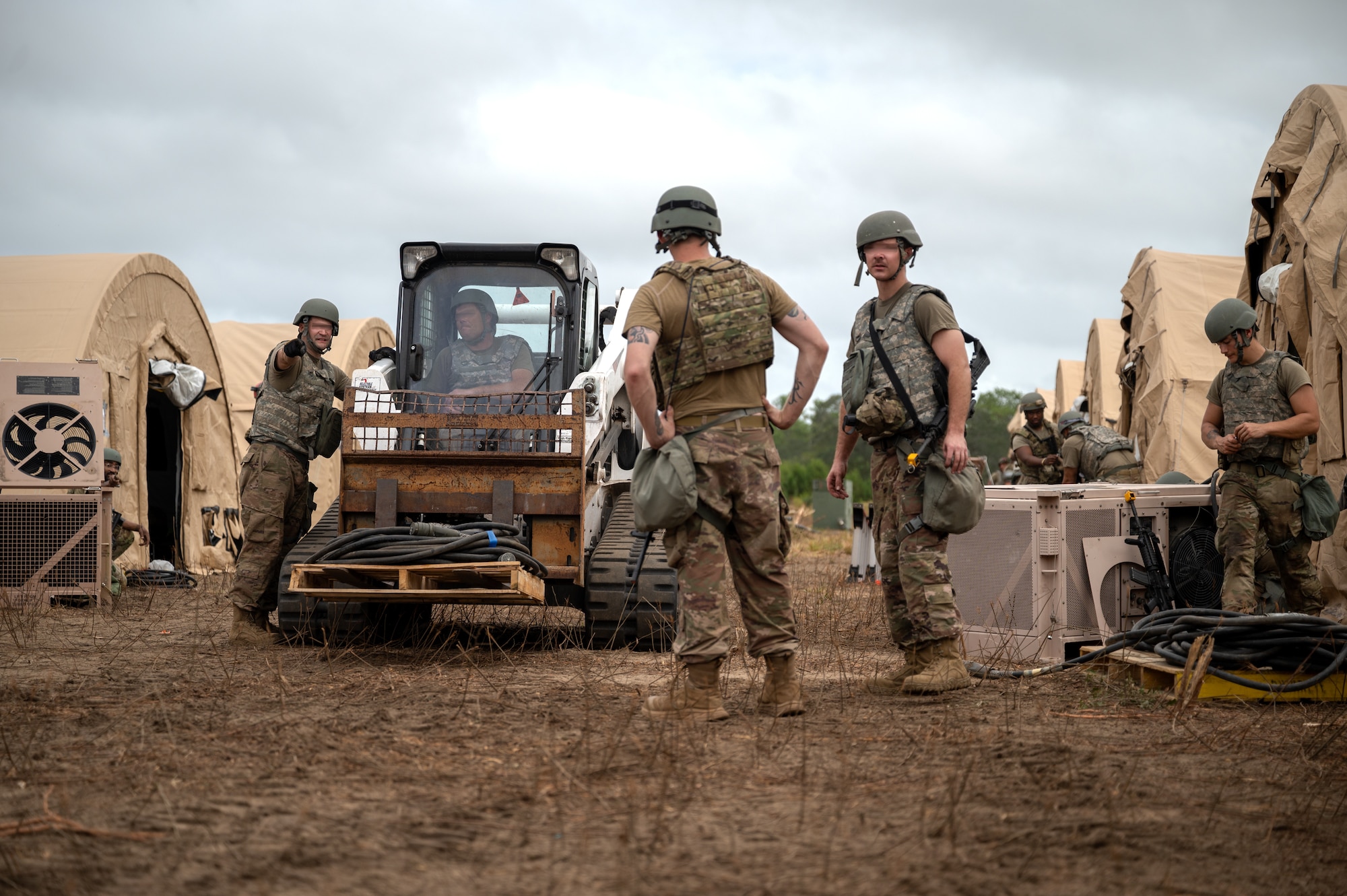 U.S. Airmen, assigned to the 1st Special Operations Mission Support Group, construct a forward operating base during a bivouac exercise on the Eglin Range at Eglin Air Force Base, Florida, Nov. 5, 2024.