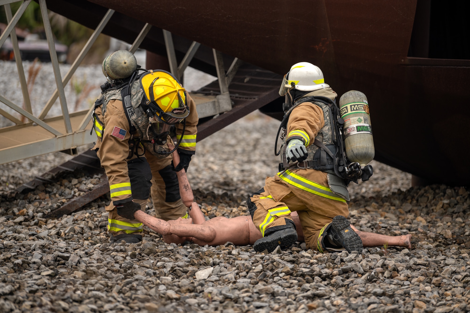U.S. Air Force firefighters assigned to the 1st Special Operations Civil Engineer Squadron rescue a simulated casualty during a bivouac exercise at Eglin Range, Eglin Air Force Base, Florida, Nov. 5, 2024.