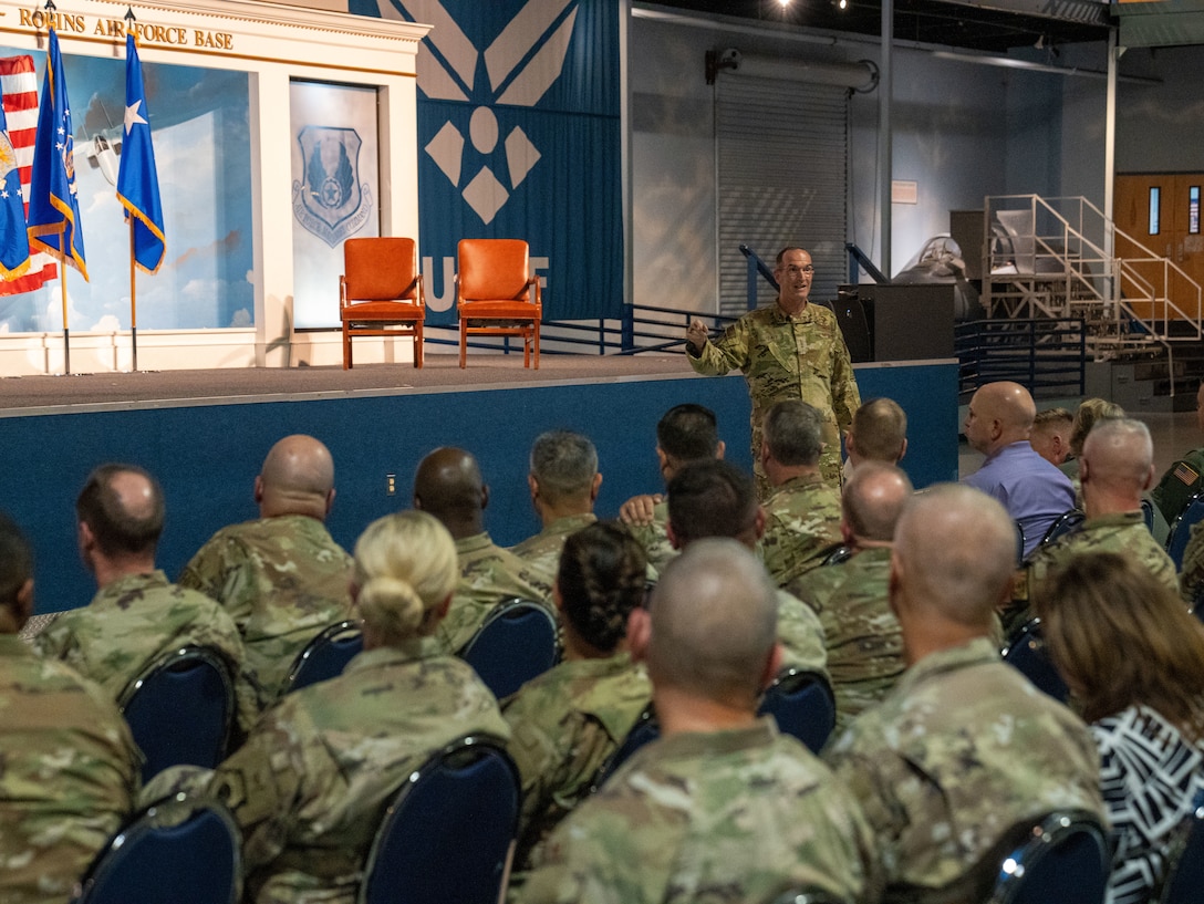 photo of Lieutenant General John P. Healy speaking to a crowd.