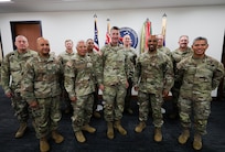 Gen. Ronald P. Clark, U.S. Army Pacific commanding general,  and senior leaders pose for a photo during the Quarterly National Guard Commanders Update Brief at Fort Shafter, Hawaii, Nov. 14, 2024. The NG CUB allows states with State Partnership Program relationships to inform the USARPAC commander on their operations in the Pacific Theater.