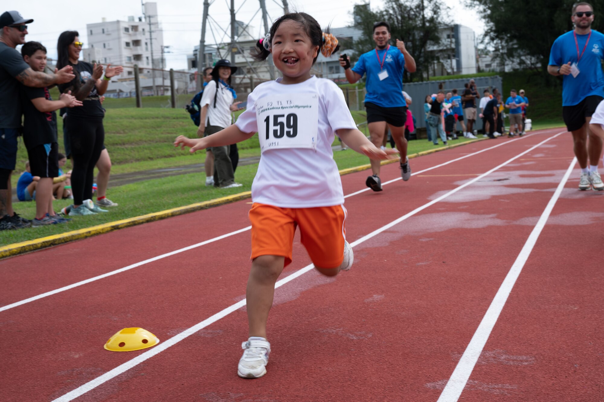 Kadena Special Olympic participant runs on the track