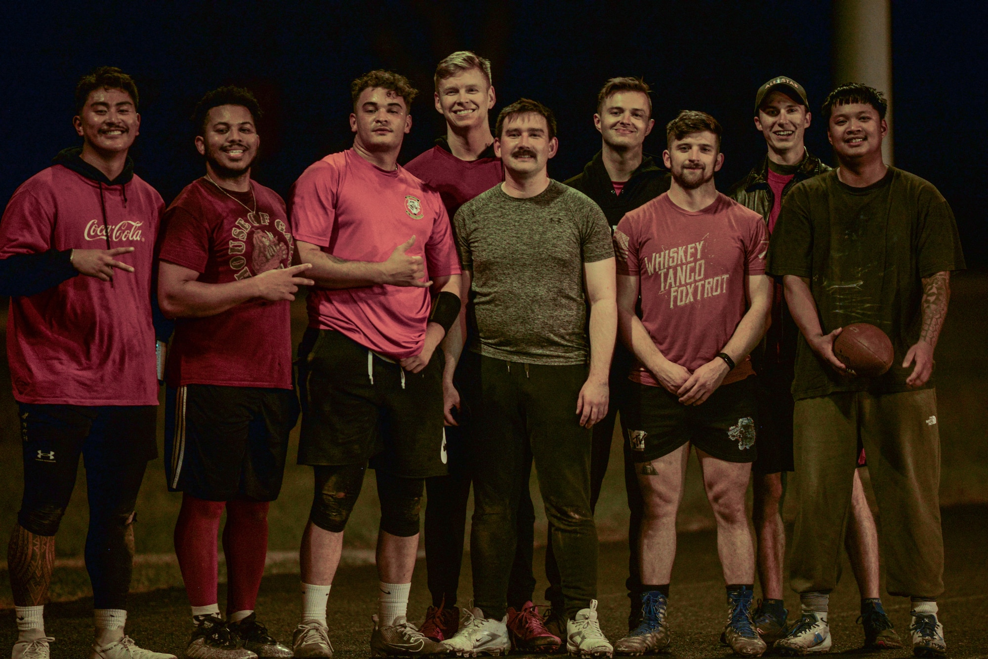 National Air and Space Intelligence Center members pose for a photo after their flag football game.