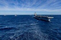 The world's largest aircraft carrier, USS Gerald R. Ford (CVN 78), sails in formation with the Arleigh Burke-class guided missile destroyers USS Winston Churchill (DDG 81), USS Mitscher (DDG 57), USS Mahan (DDG 72), USS Bainbridge (DDG 96), and USS Forrest Sherman (DDG 98) in the Atlantic Ocean, Nov. 12, 2024.