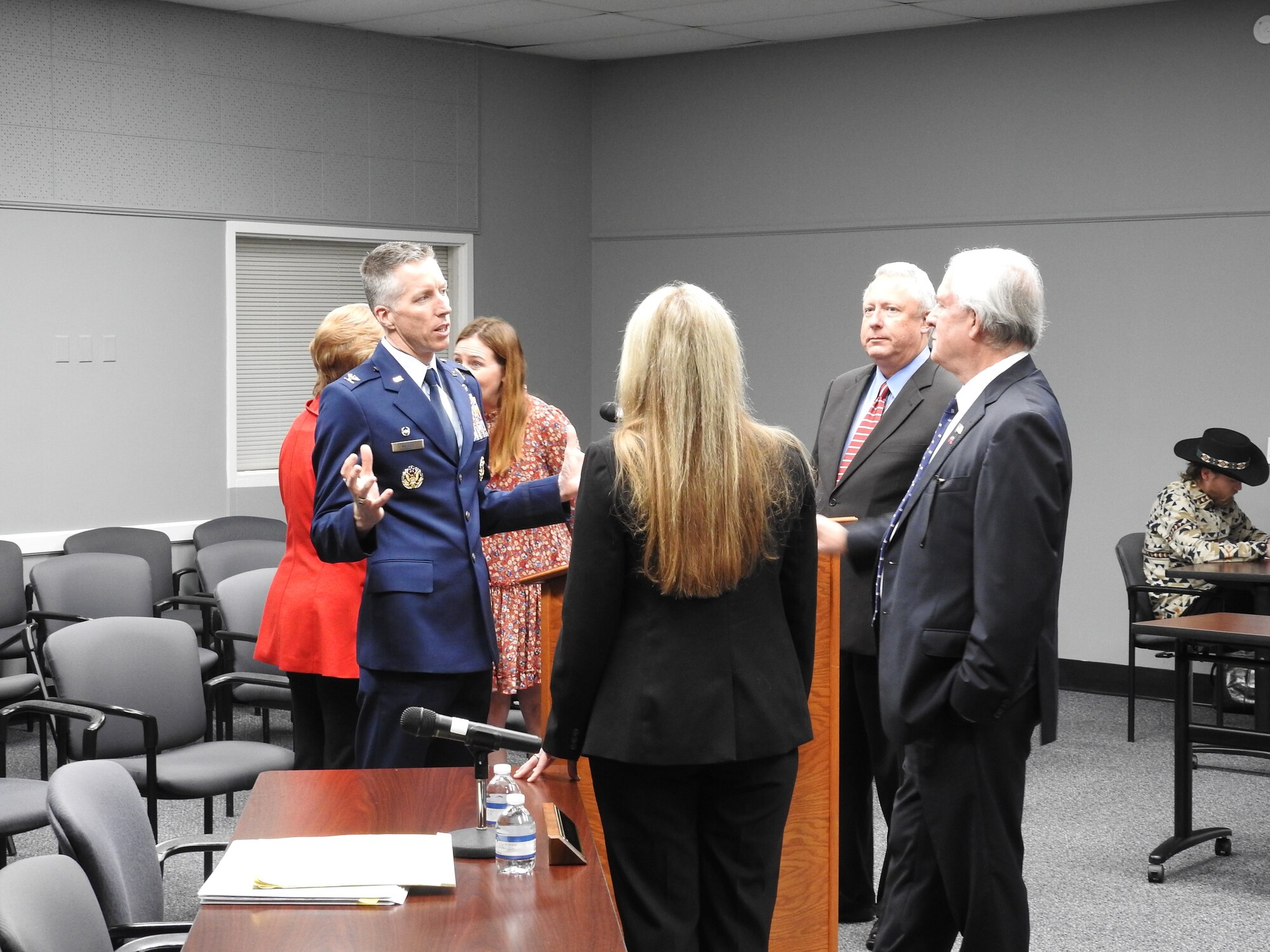 Arnold Engineering Development Complex Commander Col. Grant Mizell speaks with Tullahoma officials prior to the Nov. 11, 2024, meeting of the Tullahoma Board of Mayor and Aldermen. Pictured speaking with Mizell, from left, are Alderwoman Bobbie Wilson, Alderman Kurt Glick and City Administrator Jason Quick. Mizell, who spoke at the Tullahoma Veterans Day event earlier in the day, attended the Board of Mayor and Aldermen meeting to introduce himself to the board and discuss partnerships between the city and Arnold Air Force Base, where is AEDC is headquartered. Mizell assumed command of AEDC in June 2024. (Courtesy photo)