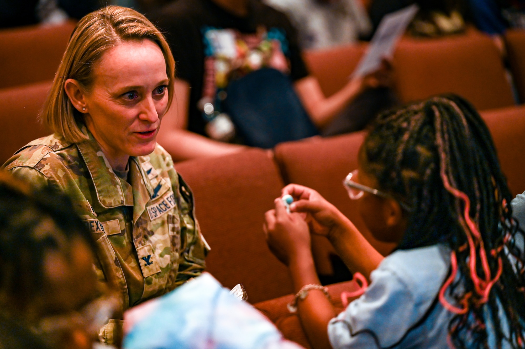 woman talks to child