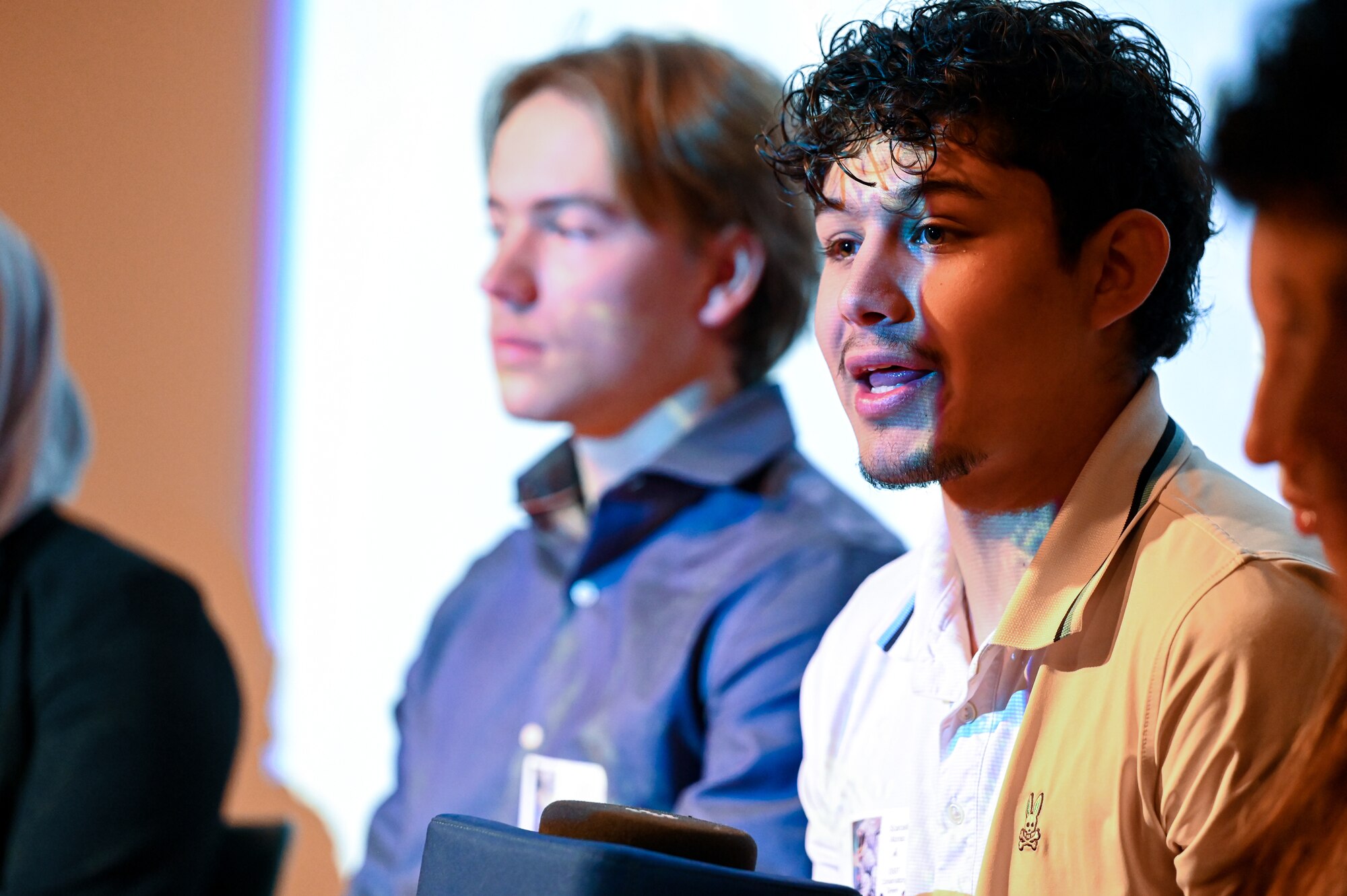 student asks question on stage