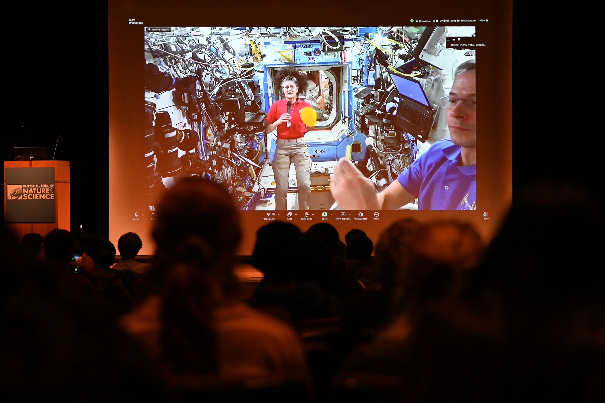 Astronaut visually demonstrates how fluid behaves in space.