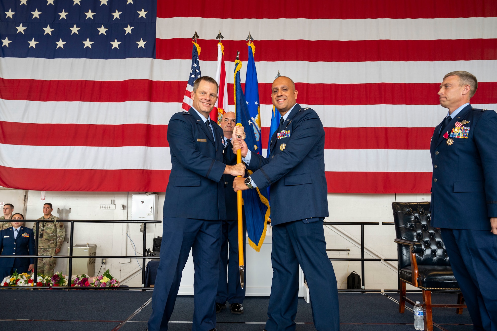 The 125th Fighter Wing hosted a change of command ceremony at the Jacksonville Air National Guard Base, Florida, Sept. 14. Outgoing commander, U.S. Air Force Col. George Downs, relinquished command to incoming commander, U.S. Air Force Col. Mansour Elhihi, before Airmen, friends and family.