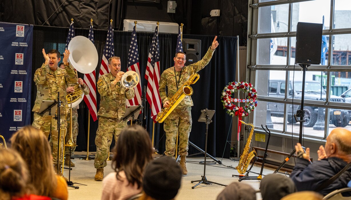 Uniformed members perform in a brass ensemble at the Buffalo Naval Park