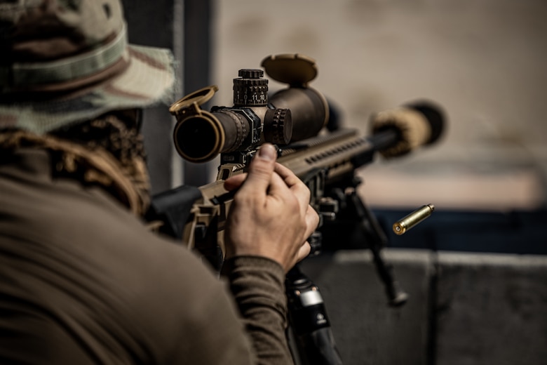 A U.S. Marine Forces Special Operations Command (MARSOC) Raider fires a MK22 Sniper Rifle during an urban warfare exercise
