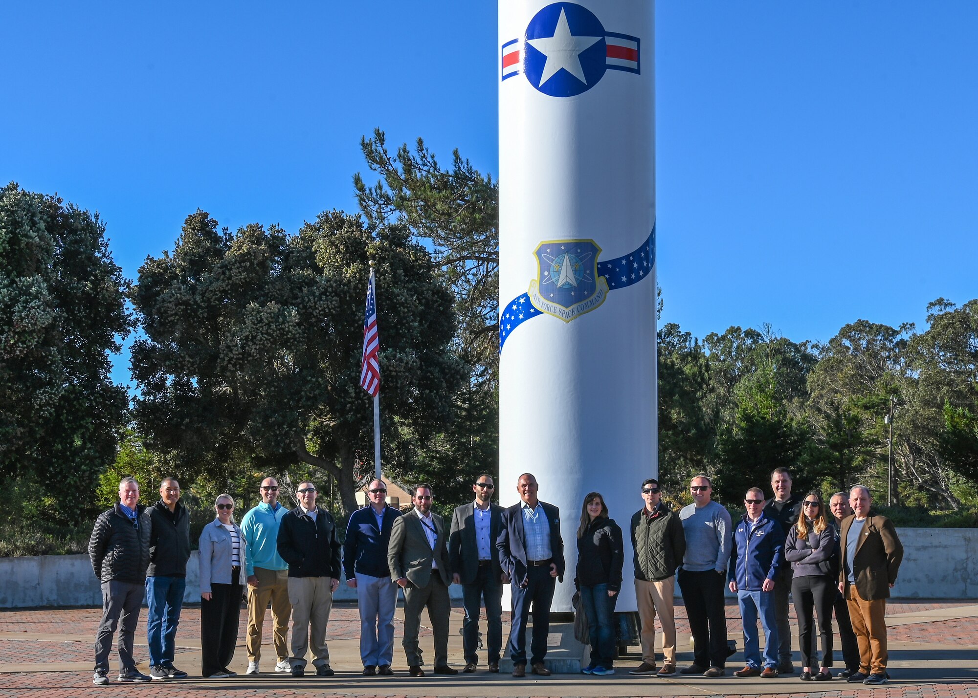 Participants of the SHIELD Executive Education Program in Global Space and Deterrence Cohort III pose for a group photo during a tour at Vandenberg Space Force Base.