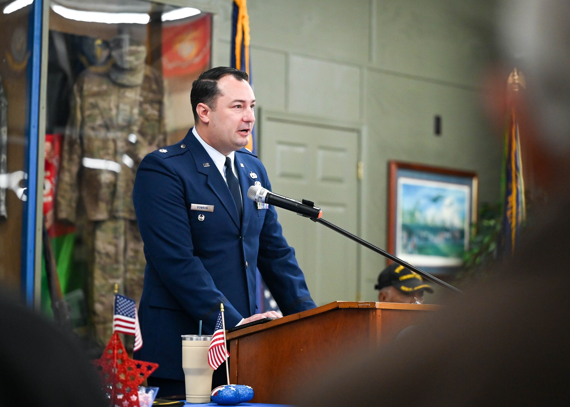 Lt. Col. Bowron speaks at a podium.