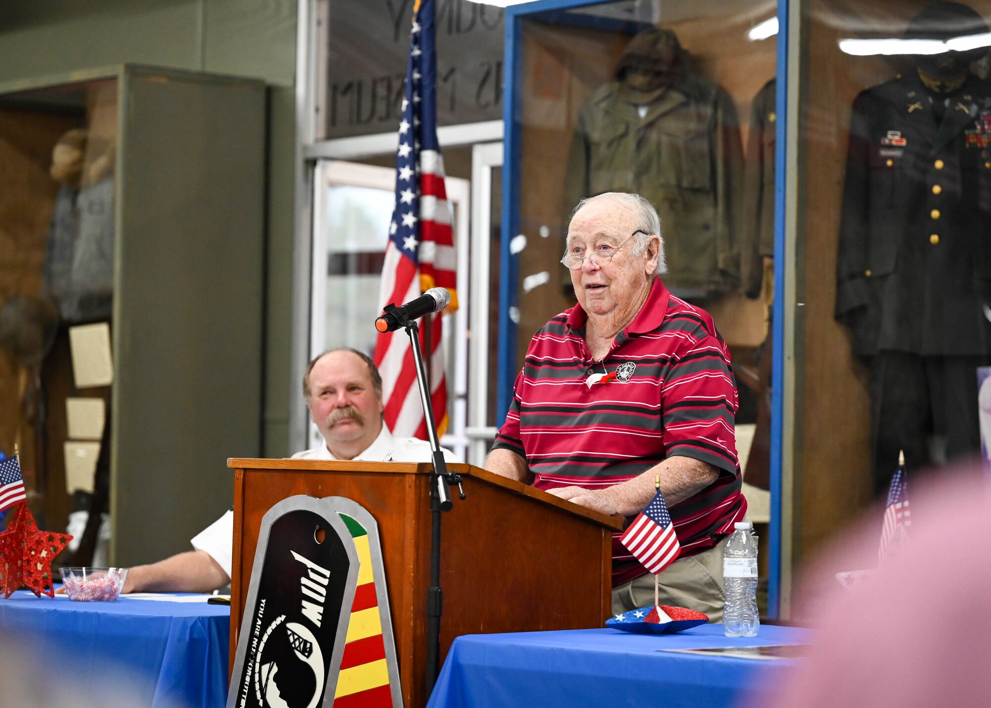 Mr. Roberts speaks at a podium.