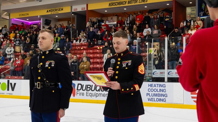 U.S. Marine Corps Staff Sgt. Chandler Swieckowski, a production recruiter with Recruiting Station Milwaukee, reads a citation, recognizing the newest members of the delayed-entry-program during the monthly pool function at Dubuque, Iowa, November 16, 2024. RSS Dubuque’s pool function consisted of conducting an oath of enlistment ceremony, recognizing the newest members of the DEP, and a traditional Marine Corps cake cutting ceremony. (U.S. Marine Corps photo by Sgt. Collette Hagen)