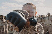 U.S. Marine Corps Recruit Addison Akers with Lima Company, 3rd Recruit Training Battalion, executes a rear hand punch during a Marine Corps Martial Arts Program class at Marine Corps Recruit Depot San Diego, California, Oct. 29, 2024. MCMAP aims to strengthen the mental and moral resiliency of recruits and Marines through realistic combative training, warrior ethos studies, and physical hardening. (U.S. Marine Corps photo by Cpl. Sarah M. Grawcock)