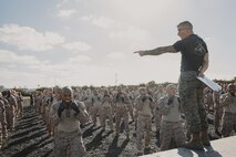 U.S. Marine Corps Martial Arts Instructor, Staff Sgt. Jacob Sinclair, with Support Battalion, Recruit Training Regiment, instructs recruits with Lima Company, 3rd Recruit Training Battalion, during a Marine Corps Martial Arts Program class at Marine Corps Recruit Depot San Diego, California, Oct. 29, 2024. MCMAP aims to strengthen the mental and moral resiliency of recruits and Marines through realistic combative training, warrior ethos studies, and physical hardening. (U.S. Marine Corps photo by Cpl. Sarah M. Grawcock)