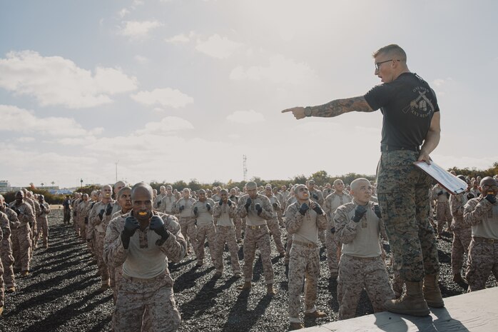 U.S. Marine Corps Martial Arts Instructor, Staff Sgt. Jacob Sinclair, with Support Battalion, Recruit Training Regiment, instructs recruits with Lima Company, 3rd Recruit Training Battalion, during a Marine Corps Martial Arts Program class at Marine Corps Recruit Depot San Diego, California, Oct. 29, 2024. MCMAP aims to strengthen the mental and moral resiliency of recruits and Marines through realistic combative training, warrior ethos studies, and physical hardening. (U.S. Marine Corps photo by Cpl. Sarah M. Grawcock)