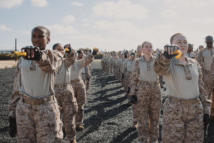 U.S. Marine Corps recruits with Lima Company, 3rd Recruit Training Battalion, prepare to wear their mouthpiece for a Marine Corps Martial Arts Program class at Marine Corps Recruit Depot San Diego, California, Oct. 29, 2024. MCMAP aims to strengthen the mental and moral resiliency of recruits and Marines through realistic combative training, warrior ethos studies, and physical hardening. (U.S. Marine Corps photo by Cpl. Sarah M. Grawcock)