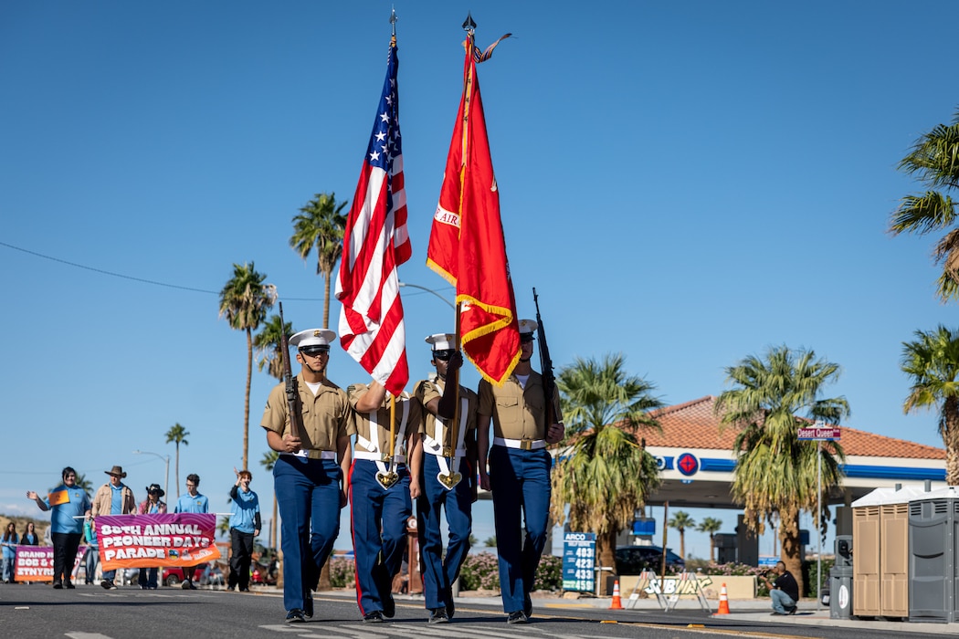 The Marine Air-Ground Task Force Training Command, Marine Corps Air-Ground Combat Center color guard marches the colors during the 88th Annual Pioneer Days Parade