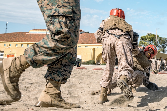 U.S. Marine Corps recruits with Fox Company, 2nd Recruit Training Battalion, participate in a body sparring event at Marine Corps Recruit Depot San Diego, California, Oct. 28, 2024. Recruits are taught Marine Corps Martial Arts Program techniques that instill basic self-defense that they will execute throughout recruit training during events like body sparring and pugil sticks to help build a warrior ethos and esprit de corps. (U.S. Marine Corps photo by Cpl. Sarah M. Grawcock)