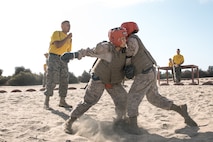 U.S. Marine Corps Sgt. Kevin Mendoza, a drill instructor with Fox Company, 2nd Recruit Training Battalion, observes a body sparring event at Marine Corps Recruit Depot San Diego, California, Oct. 28, 2024. Recruits are taught Marine Corps Martial Arts Program techniques that instill basic self-defense that they will execute throughout recruit training during events like body sparring and pugil sticks to help build a warrior ethos and esprit de corps. (U.S. Marine Corps photo by Cpl. Sarah M. Grawcock)