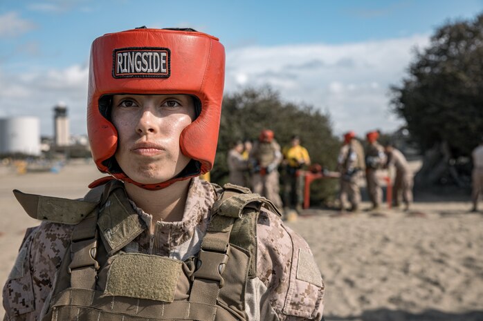 U.S. Marine Corps recruit Alexis Dye with Fox Company, 2nd Recruit Training Battalion, prepares for a body sparring event at Marine Corps Recruit Depot San Diego, California, Oct. 28, 2024. Recruits are taught Marine Corps Martial Arts Program techniques that instill basic self-defense that they will execute throughout recruit training during events like body sparring and pugil sticks to help build a warrior ethos and esprit de corps. (U.S. Marine Corps photo by Cpl. Sarah M. Grawcock)