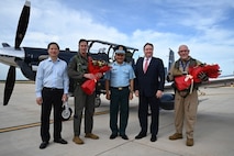 U.S. PACAF Commander Gen. Kevin Schneider, Lieutenant General Nguyen Van Hien, Commander of the Vietnam Air Defence Air Force, and U.S. Ambassador to Vietnam Marc Knapper stand by a T6-C training aircraft in Phan Thiet, Vietnam, on Nov. 20, 2024.